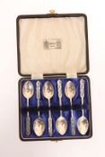 A SET OF SIX LIBERTY & CO SILVER AND ENAMEL SPOONS, Birmingham 1953, in original fitted box.