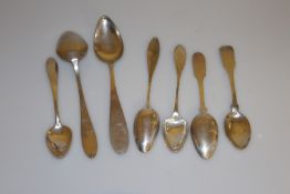 A COLLECTION OF SEVEN CONTINENTAL SILVER TABLE SPOONS, including two Fiddle pattern. (7) Gross 8.