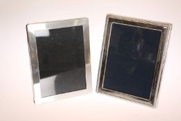TWO SILVER PHOTOGRAPH FRAMES, modern. Larger 22cm by 17.