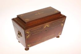 A REGENCY BRASS INLAID ROSEWOOD TEA CADDY, of sarcophagus form,