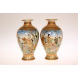 A PAIR OF JAPANESE SATSUMA VASES, LATE MEIJI PERIOD, of baluster form,