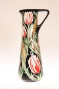 A MOORCROFT "RACE AGAINST TIME" JUG, number 14 of a limited edition of 40, first quality,