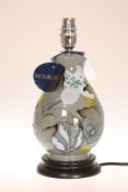 A MOORCROFT "MONTANA GREY " TABLE LAMP, with shade, first quality.