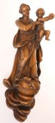 NORTHERN EUROPEAN SCHOOL, EARLY 20th CENTURY, A WALNUT CARVING OF THE MADONNA AND CHILD,