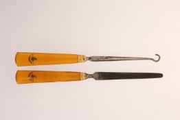 A 19TH CENTURY TORTOISESHELL HANDLED AND GOLD MOUNTED BUTTON HOOK AND NAIL FILE,