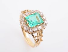 A COLOMBIAN EMERALD AND DIAMOND RING,