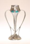 ARCHIBALD KNOX (1864-1933) FOR LIBERTY & CO AN ENGLISH PEWTER AND ENAMEL TULIP VASE, NO.