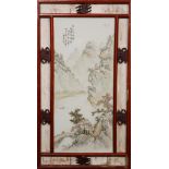 A CHINESE PORCELAIN PLAQUE, painted with a mountainous river landscape, in a wooden frame.