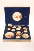 A JAPANESE SATSUMA TEA SERVICE IN A FITTED CASE, EARLY 20TH CENTURY, probably Kozan,