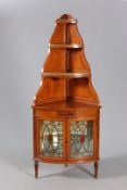 HOWARD & SONS A FINE SATINWOOD BOW-FRONT CORNER CABINET, LATE 19TH CENTURY,
