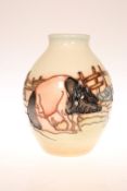 A MOORCROFT "LIMOUSIN PIGS" VASE, number 34 of a limited edition of 50, first quality.