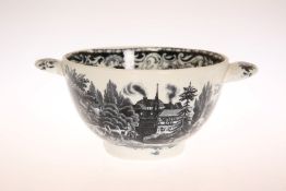 A VICTORIAN BLACK TRANSFER PRINTED POTTERY QUAICH, printed in the round with a rustic scene. 15.