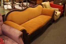 Victorian mahogany serpentine shaped back settee and scroll armchair (2)