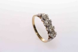 18 carat gold and four-stone diamond ring,