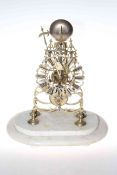 Victorian brass skeleton mantel clock on a marble base