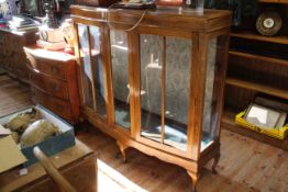 Mahogany two door bow front china cabinet on cabriole legs