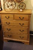 Pine chest of two short above three long drawers