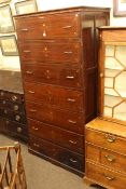Tall rosewood and brass inlaid seven drawer chest