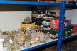 Collection of Lilliput Lane cottages and collectors plates