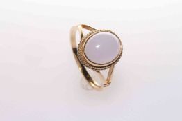 9 carat gold ring, set with a lavender coloured stone,