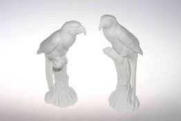 Two Beswick bisque models of parrots,