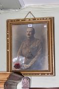 Framed photograph of a WWII Officer and two medals