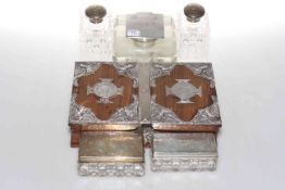 Silver topped desk inkwell, four silver topped toilet jars and bottles,
