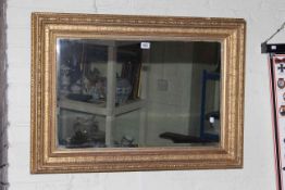 Rectangular gilt framed bevelled wall mirror