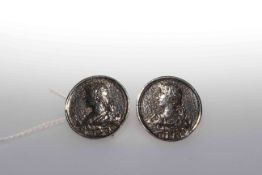 Pair of silver buttons,