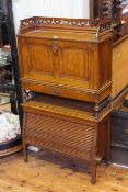 Late 19th/Early 20th Century oak bureau, the fall front above a drawer with tambour front below,