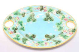 George Jones Majolica strawberry dish decorated with fruit and leaves