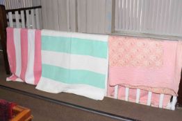 Two striped quilts and floral pattern quilt (3)