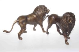 Two bronze models of lions