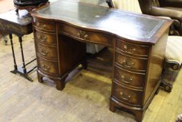 Bevan Funnell Reprodux mahogany serpentine front nine drawer pedestal desk,