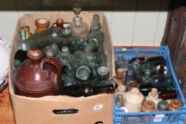 Two boxes of glass and stoneware bottles