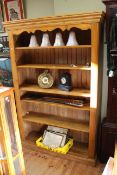 Waxed pine open bookcase with four adjustable shelves,