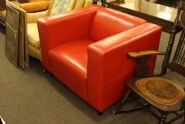 Contemporary red leather armchair