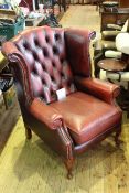 Ox blood deep buttoned back leather wing armchair