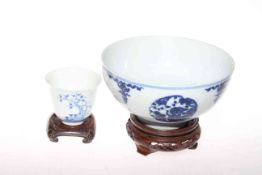 Chinese blue and white bowl with six character mark and a tea bowl with character marks,