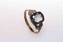 Ring set with a blue stone,