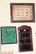 Three cased sets of fishing flies and floats