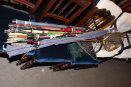 Collection of fishing rods and landing nets