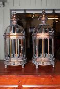 Pair of metal and glazed hanging hall lanterns