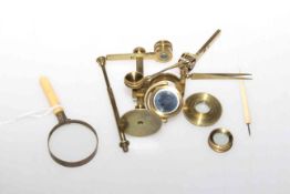 Small brass microscope, magnifying glass,