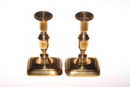 Pair of brass push-up candlesticks,