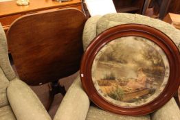 Mahogany snap top tripod table and mahogany framed circular print
