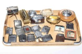 Collection of souvenir and other cigarette lighters