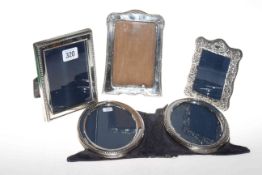 Collection of four silver mounted photographs frames,