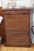 Early 20th Century oak filing cabinet, with tambour shutter front enclosing slide-out trays,