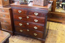 George III mahogany chest of drawers, with blind fretwork frieze and canted corners, 104.